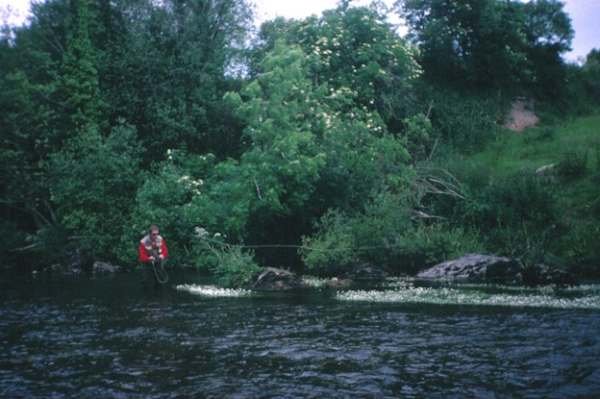 Pat casting on an Irish spate river